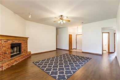 Living Room and Hallways with their brand new wood