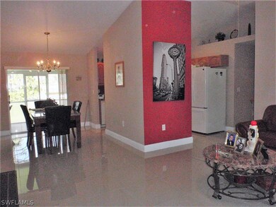 View of the spacious dining room with sliders to t