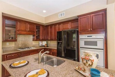 Beautiful granite in kitchen - large island with s