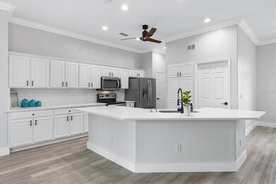 Completely Updated Kitchen w/Quartz Countertops & matching Quartz Backsplash, Soft Close Cabinets/Drawers, & Stainless Steel Appliances