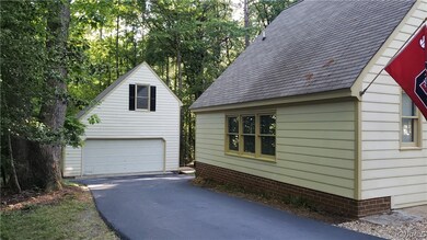 Ample parking at side yard and detached garage. As