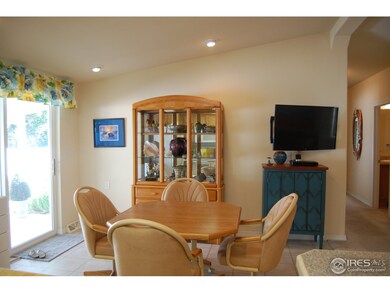 Dining room with sliding door to covered patio!