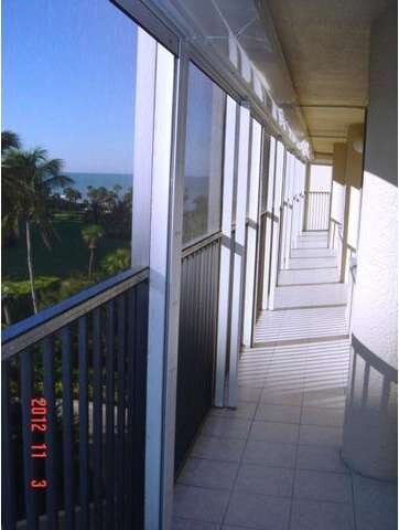BALCONY OVERLOOKING PARK AND GULF