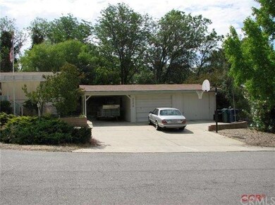 Easy access to the large carport and two garage sp