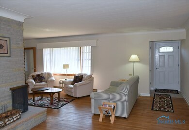 Front door into the living room - GORGEOUS hardwoo