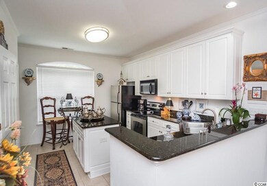 Granite, lots of cupboards, island, stainless stee