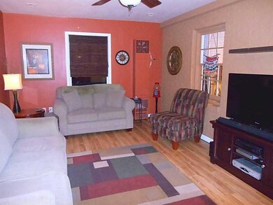 Den. Hardwood Floors