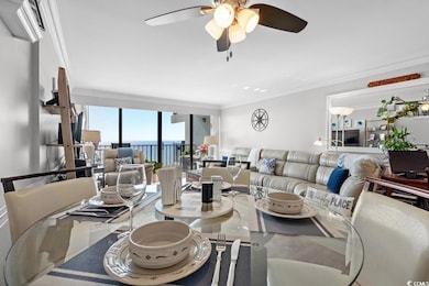 Dining space featuring crown molding and ceiling f