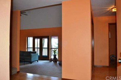 The lovely natural wood floors will greet you upon