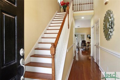 View from front door looking down the hallway to d