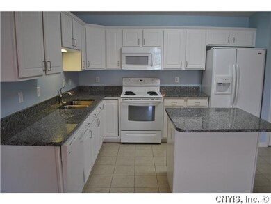 Kitchen. Kitchen has lots of cupboard space, plus a pantry to the right of the fridge. Price out a new patio home and add the granite, hardwoods and ceramic...you will be amazed at what you can save!