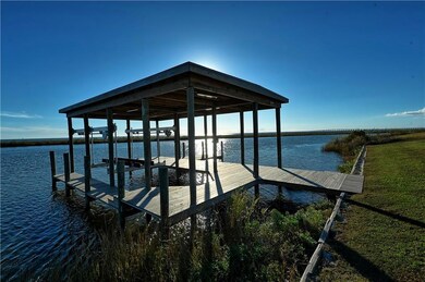 Private boat dock with a 16,000lb boat lift. Ready
