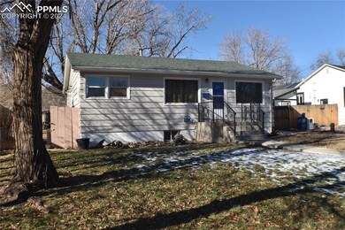 View of front of property with a front lawn