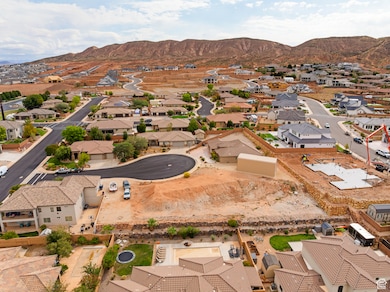 Aerial perspective of suburban area with a mountain backdrop