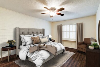 Virtually staged master suite reflects generous si