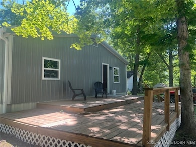 Front of home with front deck