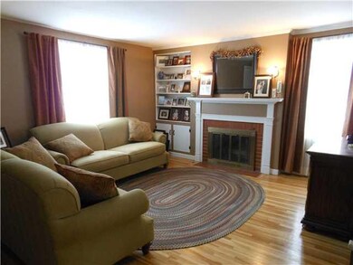 Living Room. Hardwood floors, built-in shelving, r