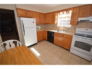 Kitchen. Cozy describes this 11  x 10  eat-in-kitc