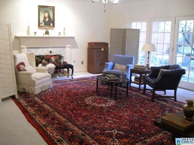Gas log fireplace with marble surround and French 