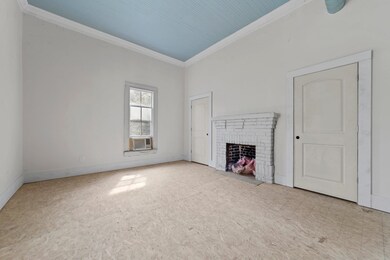 Front bedroom with fireplace.