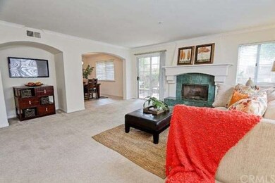 Arched doorway to dining room and shot of sliding 