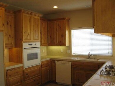 Rustic alder cabinets, gas stove top, well built k