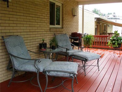 Exterior Front. Relax on the spacious deck in your