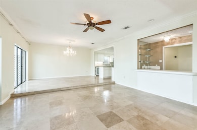 DEN/LOUNGE-Located between the living area and dining room, this space could be an extension of the living room or set up as a lounge area off of the bar. There are multiple ways to one can use this area.