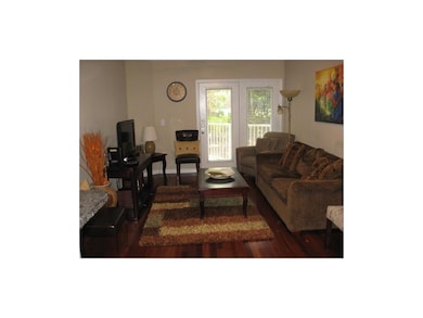 Living area with wood finished floors