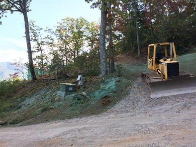 Driveway going up on to building area