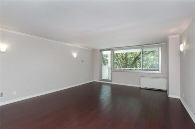 Combination living room and dining room with wall 