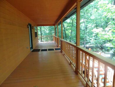 fFront deck extends the length of the house with a
