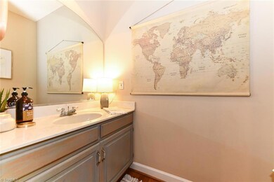 Powder Room - conveniently located off entry.