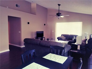 Living/Dining Area has display/plant shelf built i