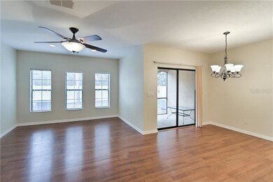 Family and dining rooms with beautiful laminate fl