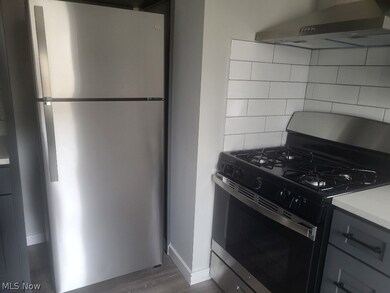 3424 Beechwood Ave, Cleveland, OH 44118 - photo 5