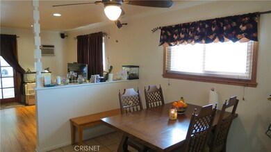 eating area in the kitchen with ceiling fan