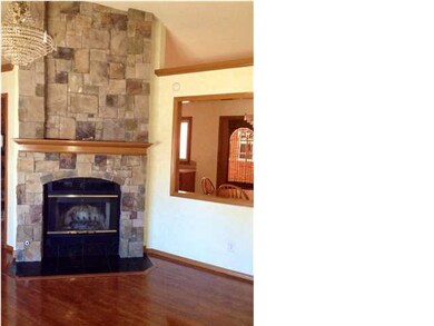 Beautiful full stone fireplace.