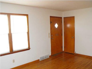 Coat Closet at the Entrance ~ Living Room Windows 