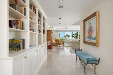 Hallway with built in book cases