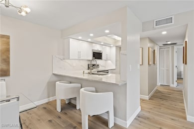 The open layout flows seamlessly into the dining a