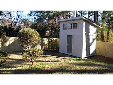 Shed or could be child's playhouse. New fenced-in 