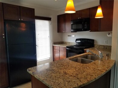 Lovely granite countertops with updated cabinets a