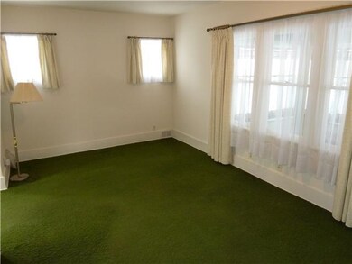 Living Room Hardwoods underneath carpet!