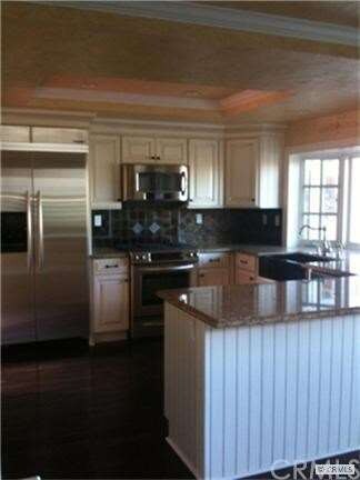 Highly upgraded kitchen with gorgeous view.
