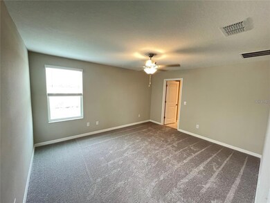 31454 Barrel Wave Way, Wesley Chapel, FL 33545 - photo 7