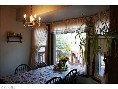 Kitchen - Sunny walkout bay!  The perfect spot to 