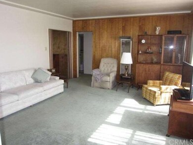 Accordian doors to left open to the den.  Door to 