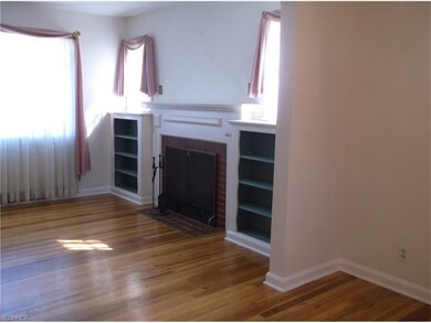 Living Room has beautiful hard wood floors, fresh 