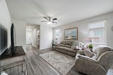 Looking back toward the front door. Laundry room and closet on the right.